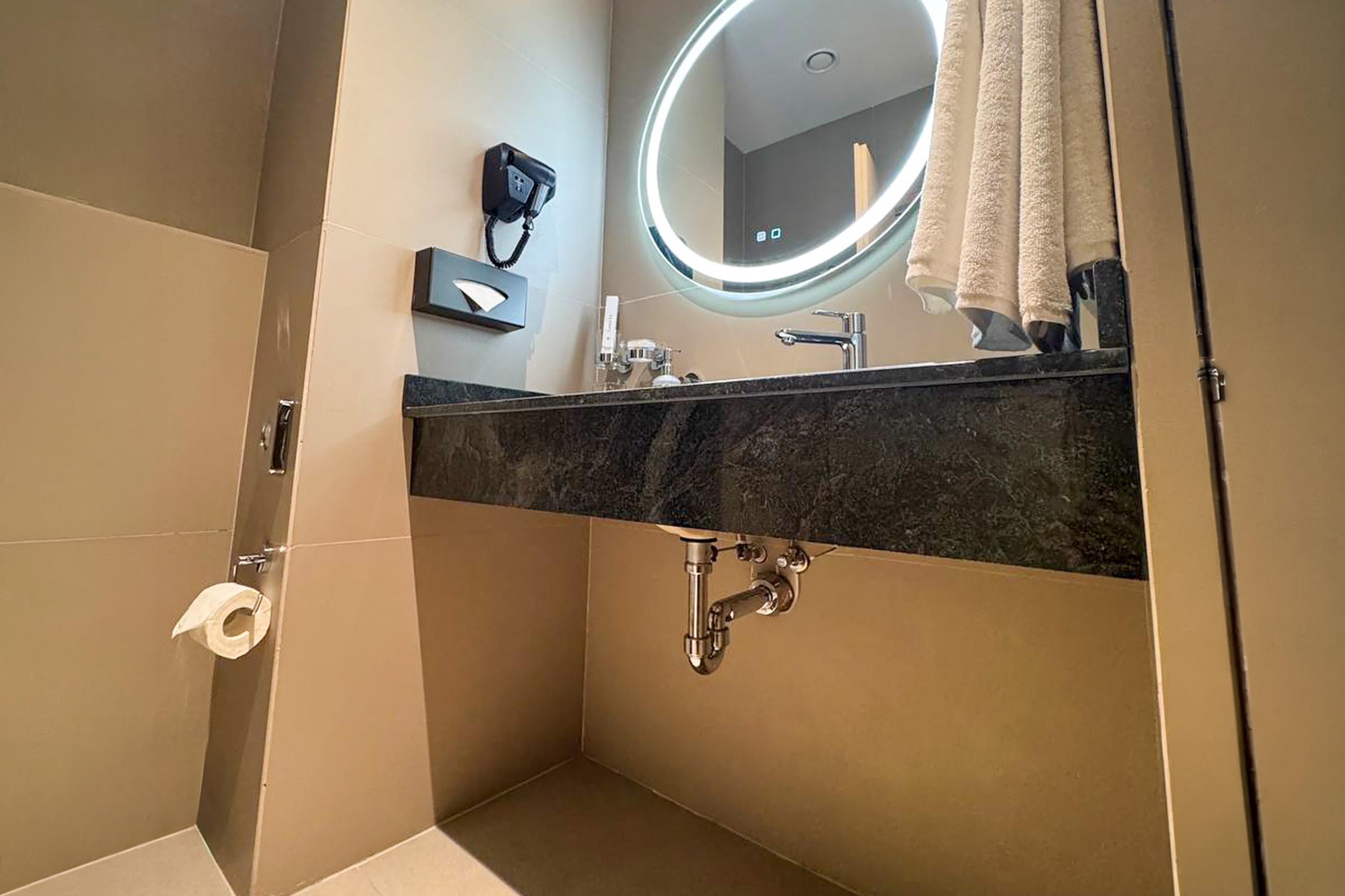 Guest room bath at the Ramada Plaza by Wyndham Tashkent Airport in Tashkent, Other than US/Canada