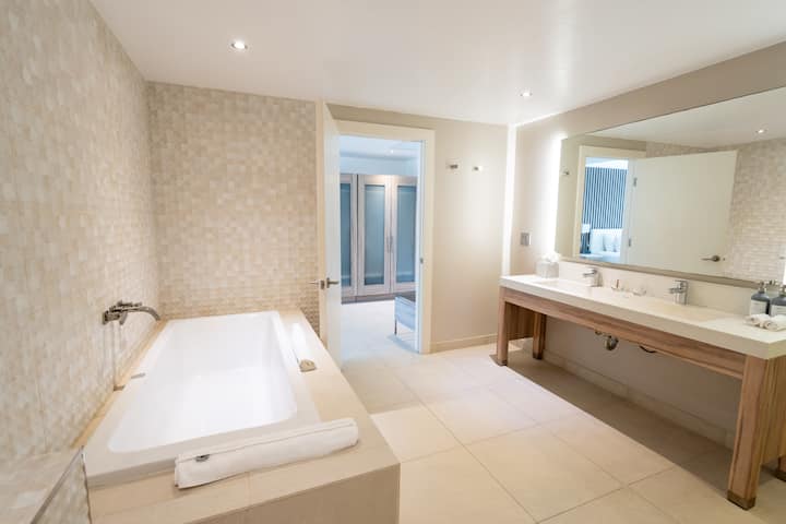 Guest room bath at the Hodges Bay Resort & Spa, an HQ Luxury Resort & Residences in St. Johns, Other than US/Canada