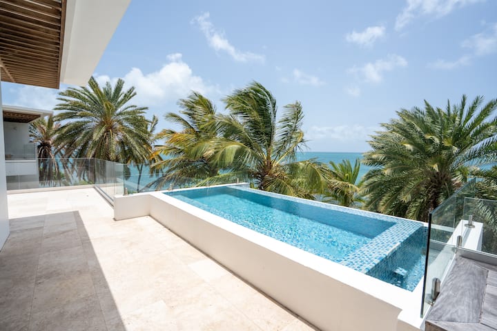 Guest room at the Hodges Bay Resort & Spa, an HQ Luxury Resort & Residences in St. Johns, Other than US/Canada