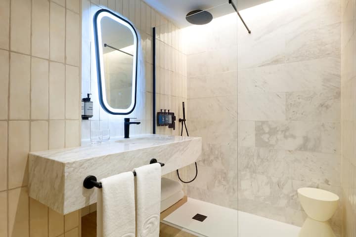 Guest room bath at the Grand Palladium Select Palace Ibiza in Sant Jordi De Ses Salines, Other than US/Canada