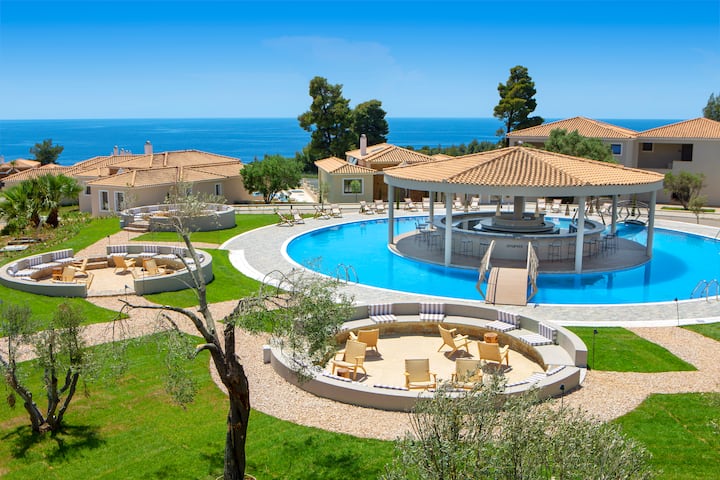 Pool bar at the Ajul Luxury Hotel & Spa Resort, A Registry Collection Hotel in Agia Paraskevi Chalikidi, Other than US/Canada