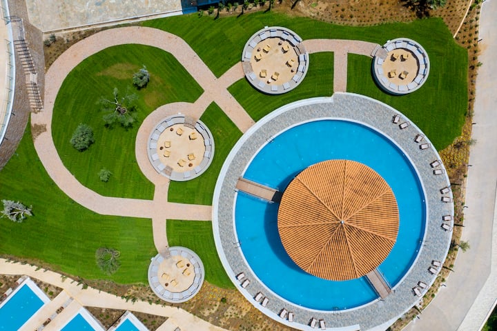 Pool bar at the Ajul Luxury Hotel & Spa Resort, A Registry Collection Hotel in Agia Paraskevi Chalikidi, Other than US/Canada