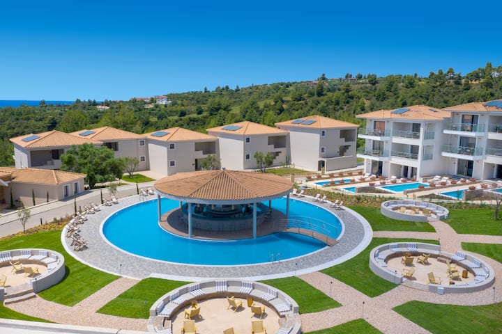 Pool bar at the Ajul Luxury Hotel & Spa Resort, A Registry Collection Hotel in Agia Paraskevi Chalikidi, Other than US/Canada