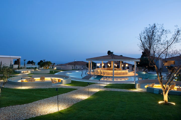 Pool bar at the Ajul Luxury Hotel & Spa Resort, A Registry Collection Hotel in Agia Paraskevi Chalikidi, Other than US/Canada