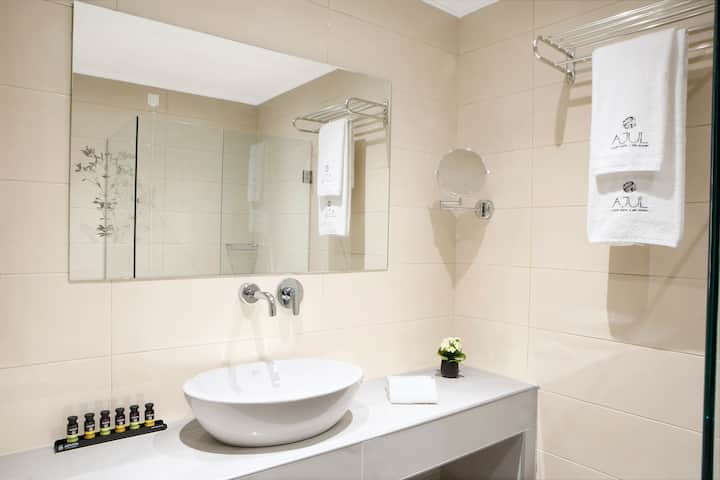 Guest room bath at the Ajul Luxury Hotel & Spa Resort, A Registry Collection Hotel in Agia Paraskevi Chalikidi, Other than US/Canada
