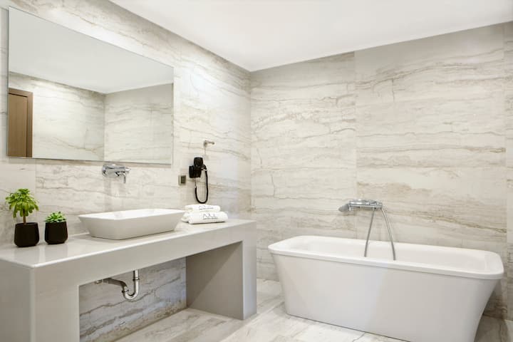 Guest room bath at the Ajul Luxury Hotel & Spa Resort, A Registry Collection Hotel in Agia Paraskevi Chalikidi, Other than US/Canada