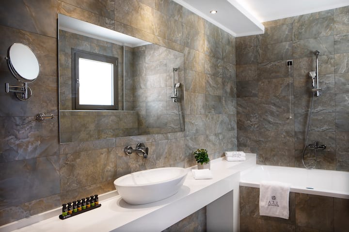 Guest room bath at the Ajul Luxury Hotel & Spa Resort, A Registry Collection Hotel in Agia Paraskevi Chalikidi, Other than US/Canada