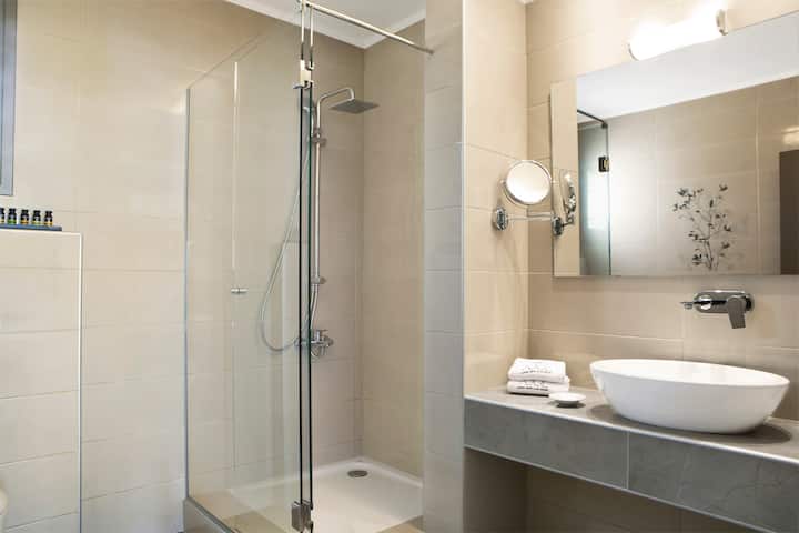 Guest room bath at the Ajul Luxury Hotel & Spa Resort, A Registry Collection Hotel in Agia Paraskevi Chalikidi, Other than US/Canada