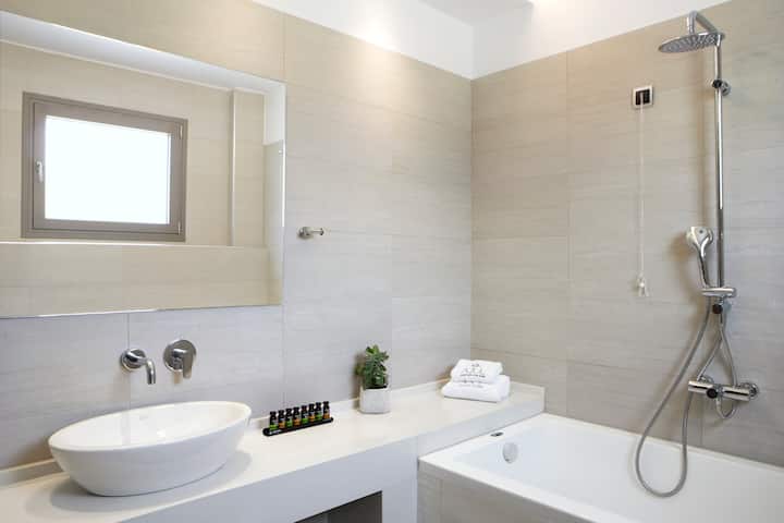 Guest room bath at the Ajul Luxury Hotel & Spa Resort, A Registry Collection Hotel in Agia Paraskevi Chalikidi, Other than US/Canada