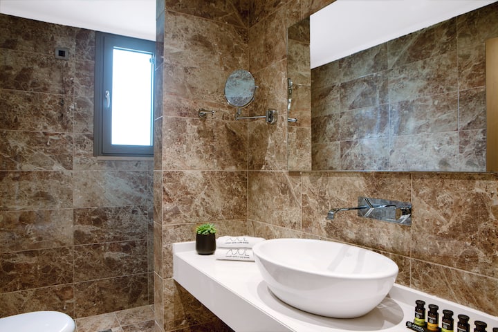 Guest room bath at the Ajul Luxury Hotel & Spa Resort, A Registry Collection Hotel in Agia Paraskevi Chalikidi, Other than US/Canada