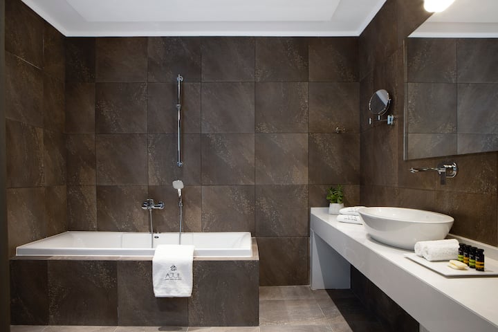 Guest room bath at the Ajul Luxury Hotel & Spa Resort, A Registry Collection Hotel in Agia Paraskevi Chalikidi, Other than US/Canada
