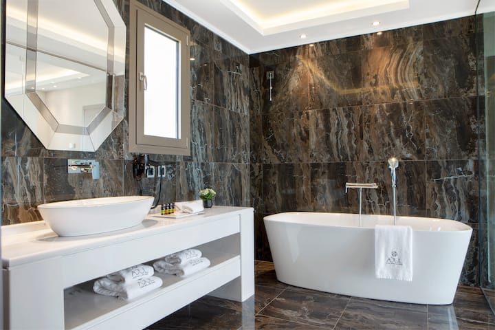 Guest room bath at the Ajul Luxury Hotel & Spa Resort, A Registry Collection Hotel in Agia Paraskevi Chalikidi, Other than US/Canada