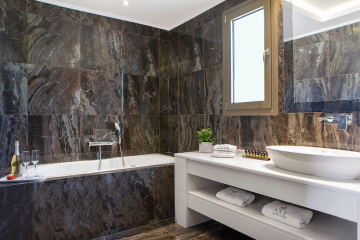 Guest room bath at the Ajul Luxury Hotel & Spa Resort, A Registry Collection Hotel in Agia Paraskevi Chalikidi, Other than US/Canada