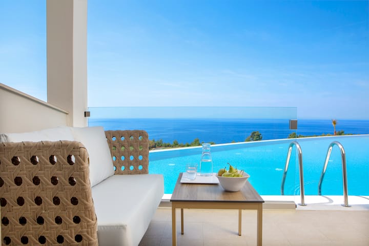 Guest room at the Ajul Luxury Hotel & Spa Resort, A Registry Collection Hotel in Agia Paraskevi Chalikidi, Other than US/Canada