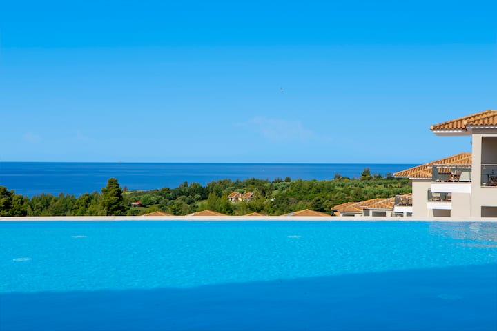 Guest room at the Ajul Luxury Hotel & Spa Resort, A Registry Collection Hotel in Agia Paraskevi Chalikidi, Other than US/Canada