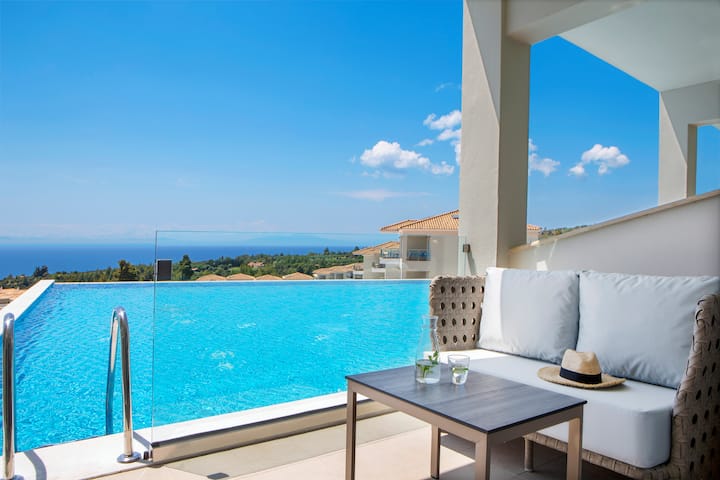 Guest room at the Ajul Luxury Hotel & Spa Resort, A Registry Collection Hotel in Agia Paraskevi Chalikidi, Other than US/Canada
