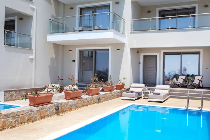 Guest room at the Ajul Luxury Hotel & Spa Resort, A Registry Collection Hotel in Agia Paraskevi Chalikidi, Other than US/Canada