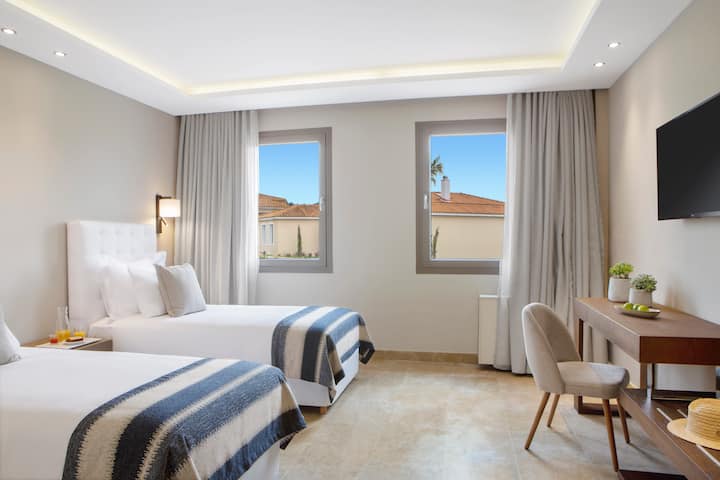 Guest room at the Ajul Luxury Hotel & Spa Resort, A Registry Collection Hotel in Agia Paraskevi Chalikidi, Other than US/Canada