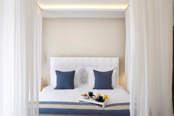 Guest room at the Ajul Luxury Hotel & Spa Resort, A Registry Collection Hotel in Agia Paraskevi Chalikidi, Other than US/Canada