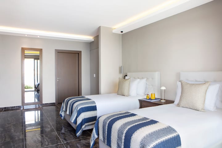 Guest room at the Ajul Luxury Hotel & Spa Resort, A Registry Collection Hotel in Agia Paraskevi Chalikidi, Other than US/Canada