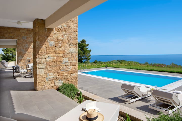 Guest room at the Ajul Luxury Hotel & Spa Resort, A Registry Collection Hotel in Agia Paraskevi Chalikidi, Other than US/Canada