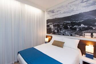 Guest room at the Super 8 Santa Luzia in Santa Luzia, Other than US/Canada