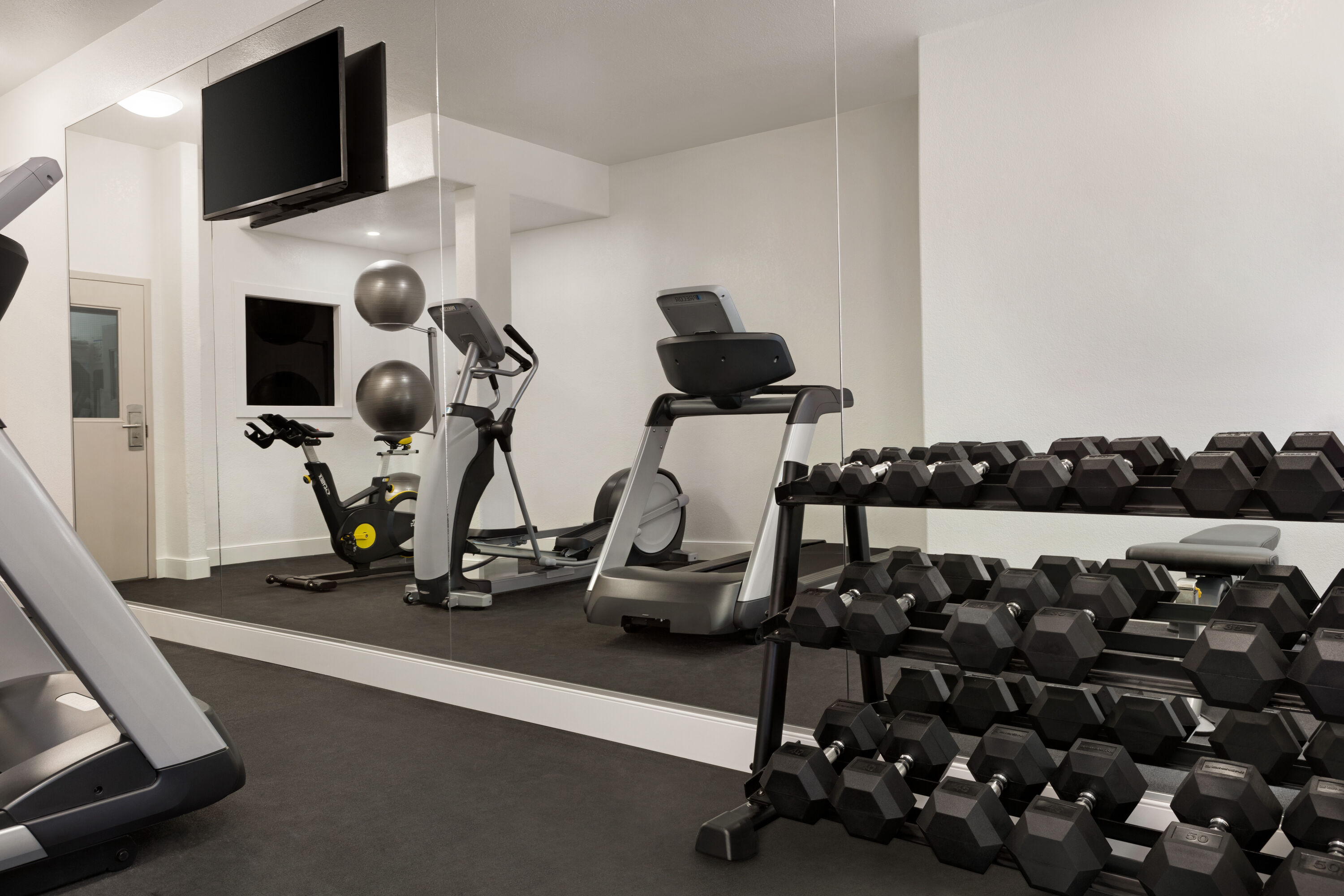 Fitness room at Super 8 by Wyndham Calgary Shawnessy Area in Calgary, Alberta