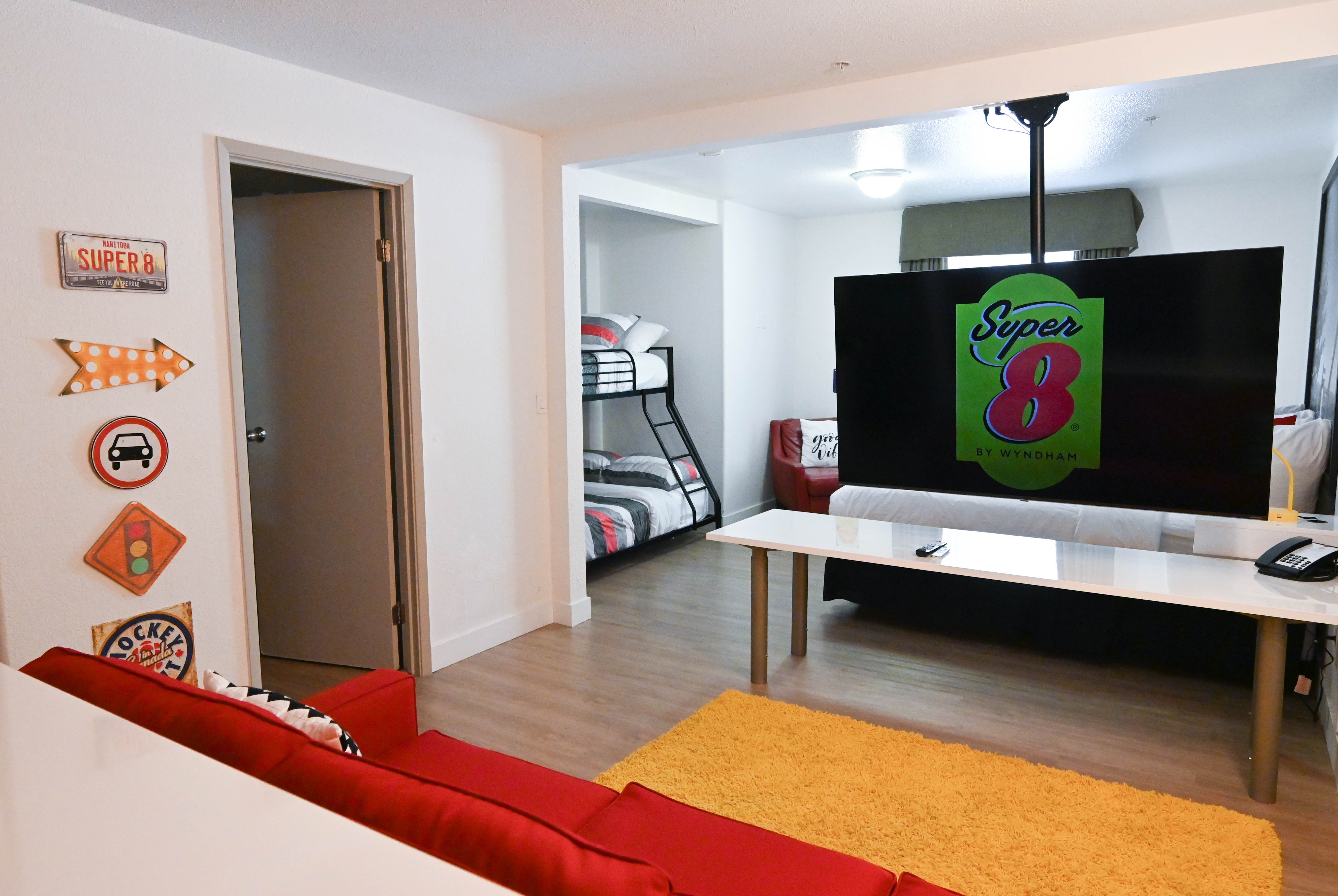 King bed guest room at the Super 8 by Wyndham Calgary Shawnessy Area in Calgary, Alberta