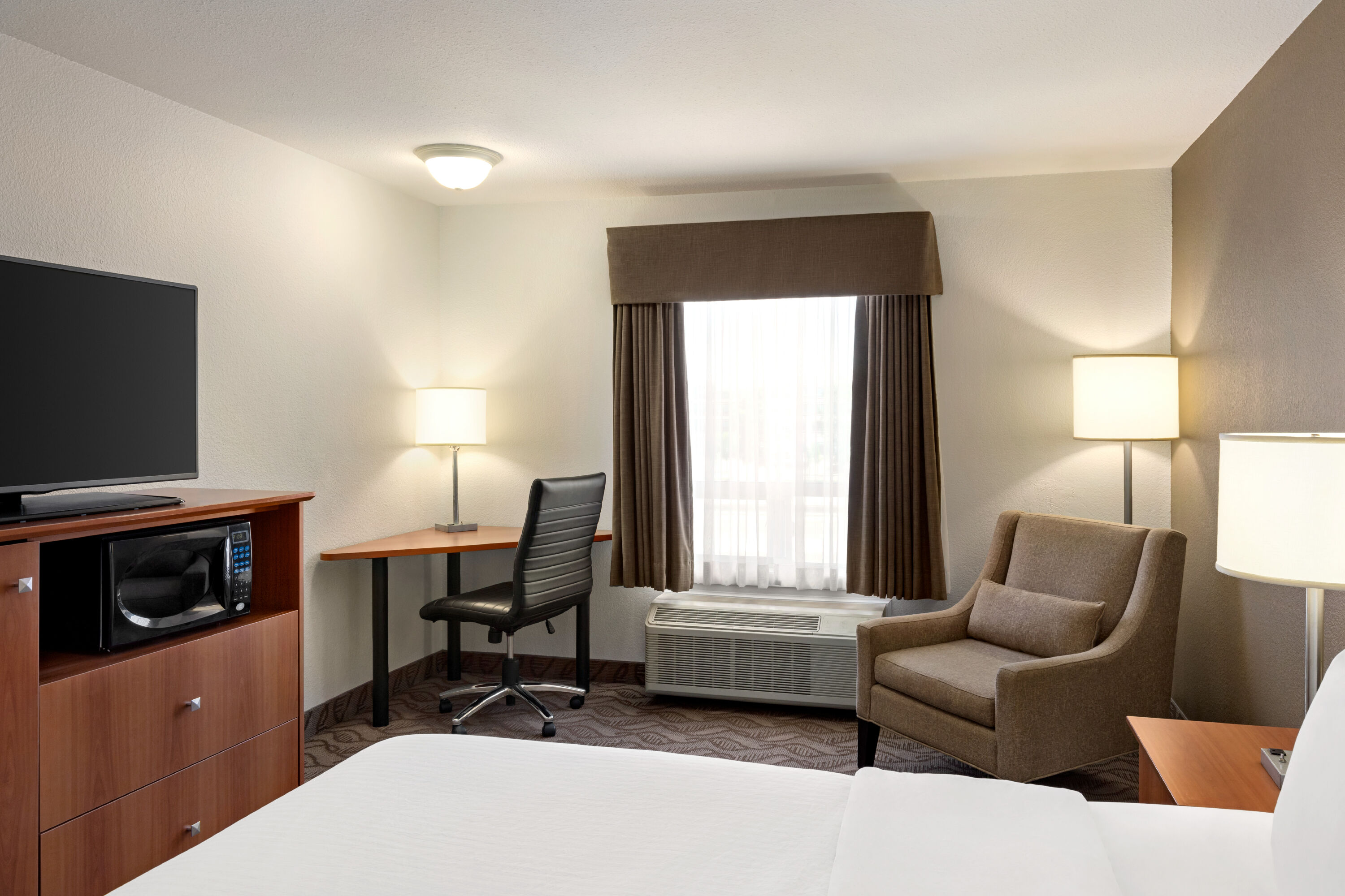 Guest room at the Super 8 by Wyndham Calgary Shawnessy Area in Calgary, Alberta