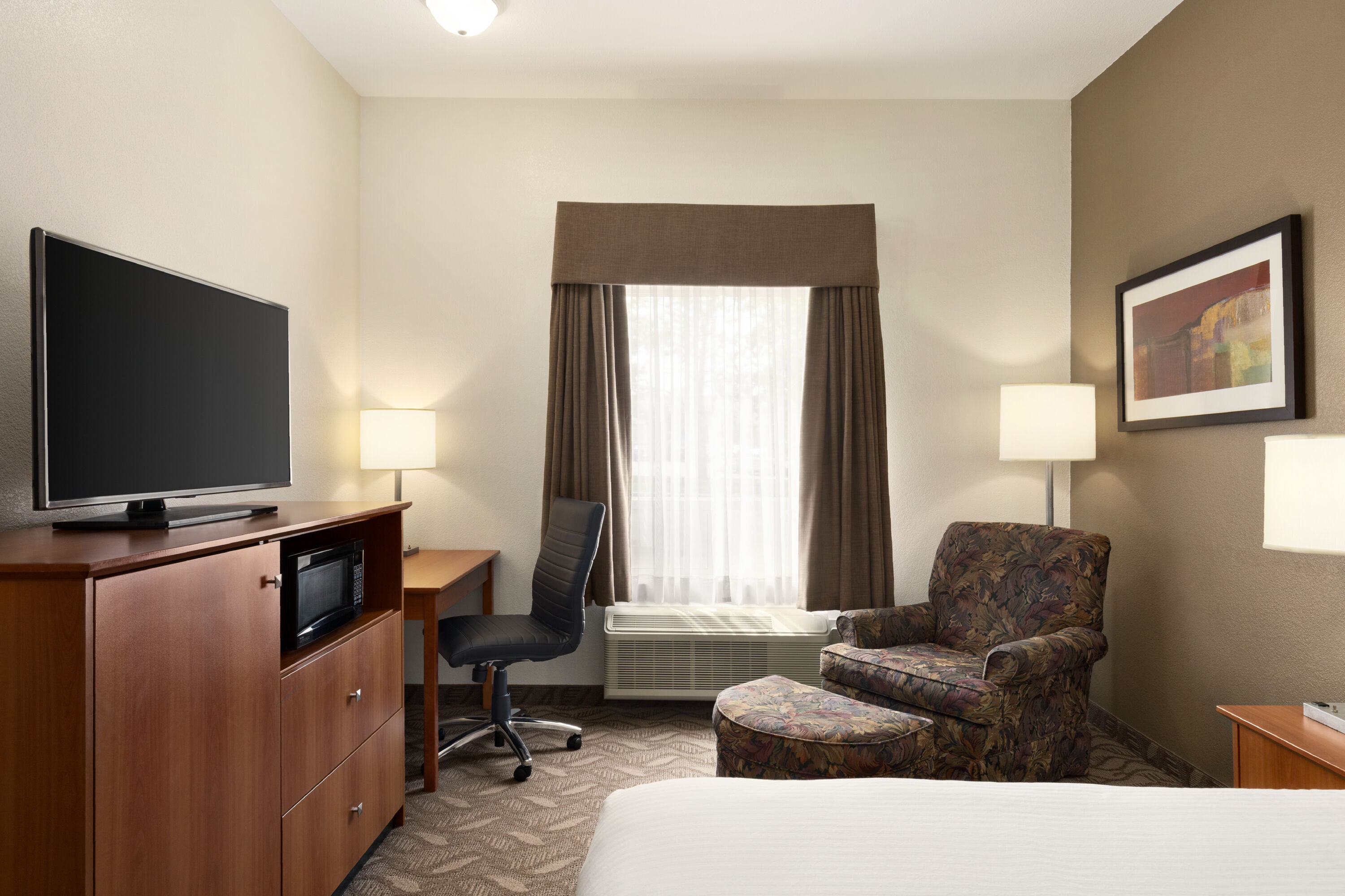 Guest room at the Super 8 by Wyndham Calgary Shawnessy Area in Calgary, Alberta