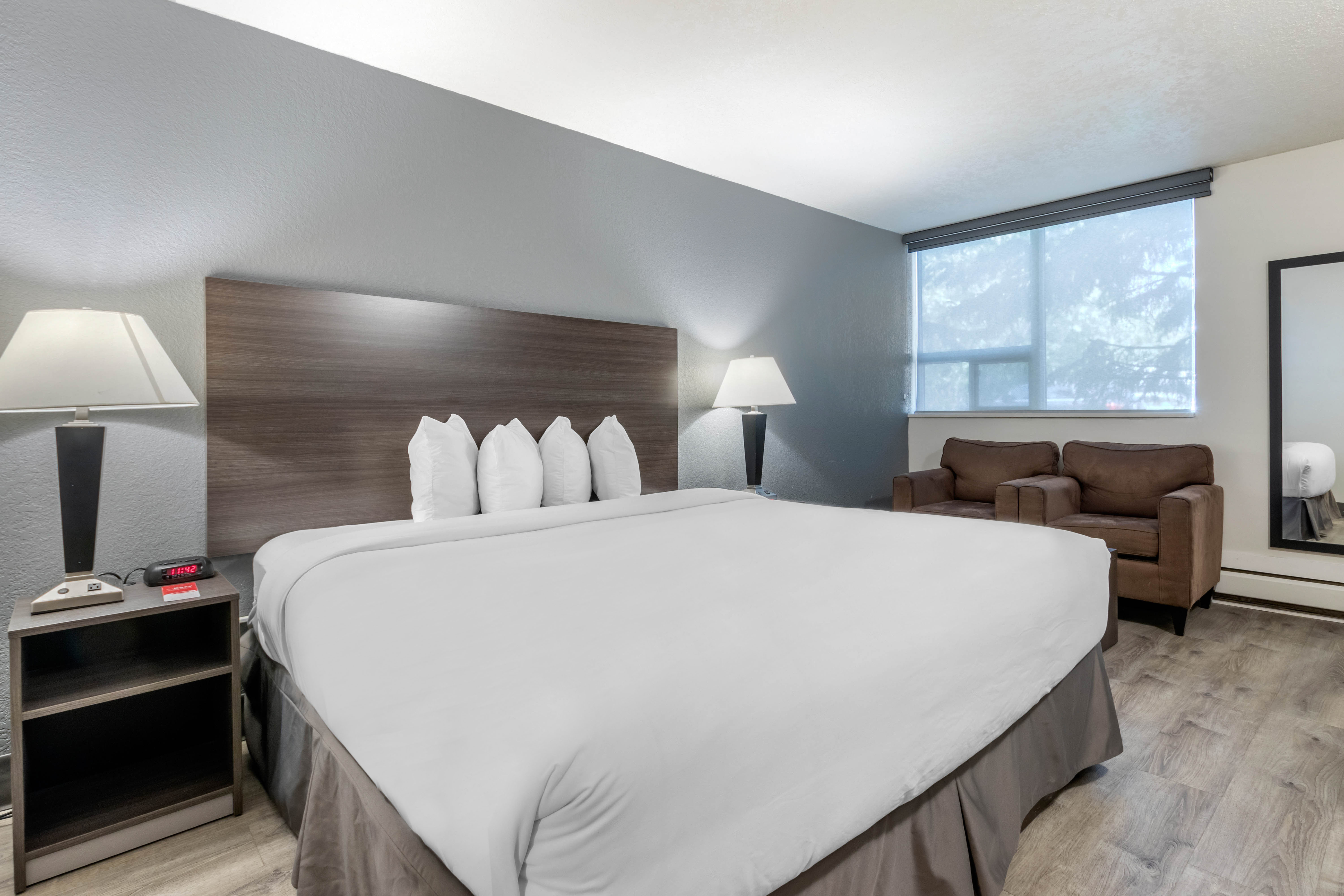 Guest room at the Super 8 by Wyndham Macleod Trail Calgary in Calgary, Alberta