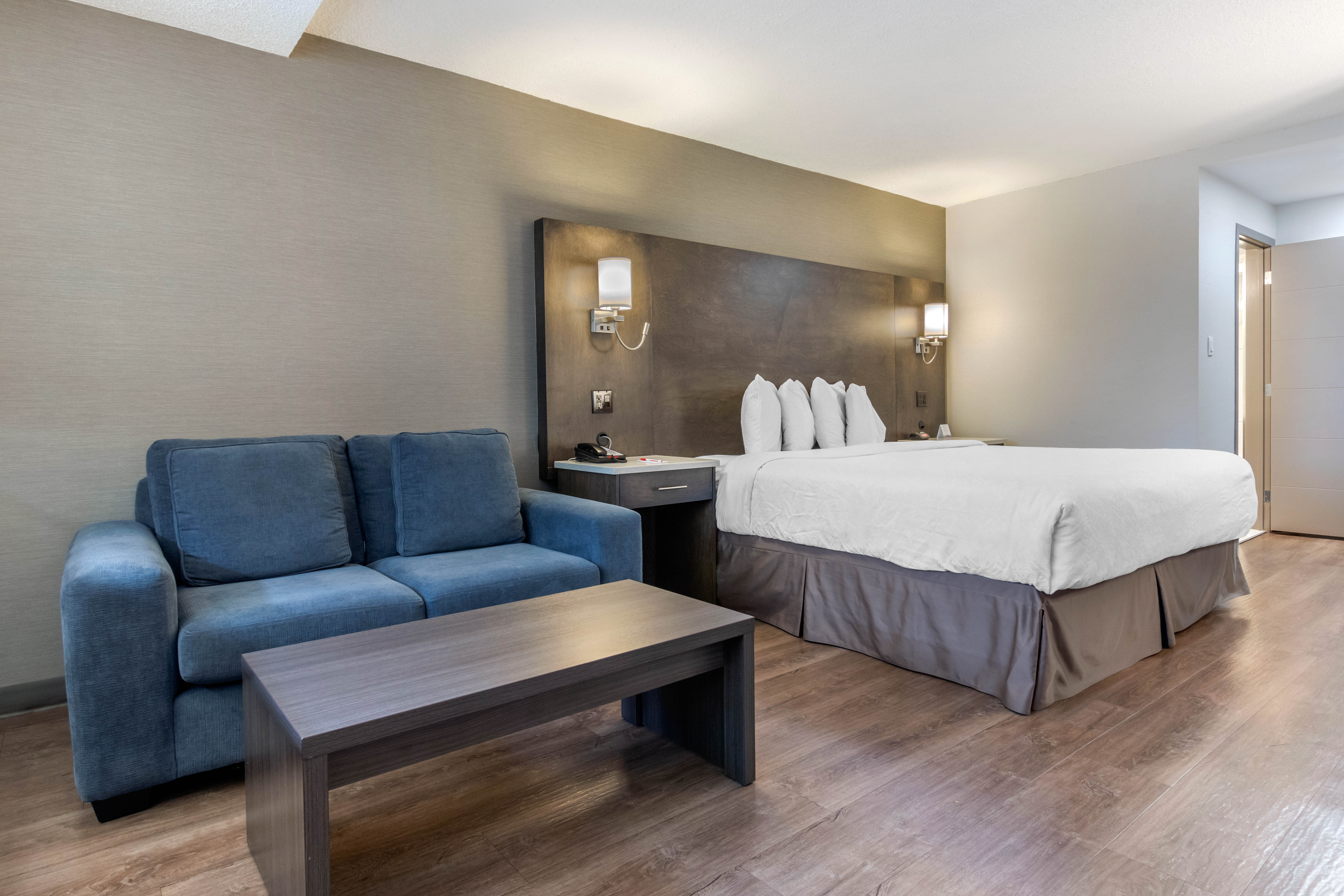 Guest room at the Super 8 by Wyndham Macleod Trail Calgary in Calgary, Alberta