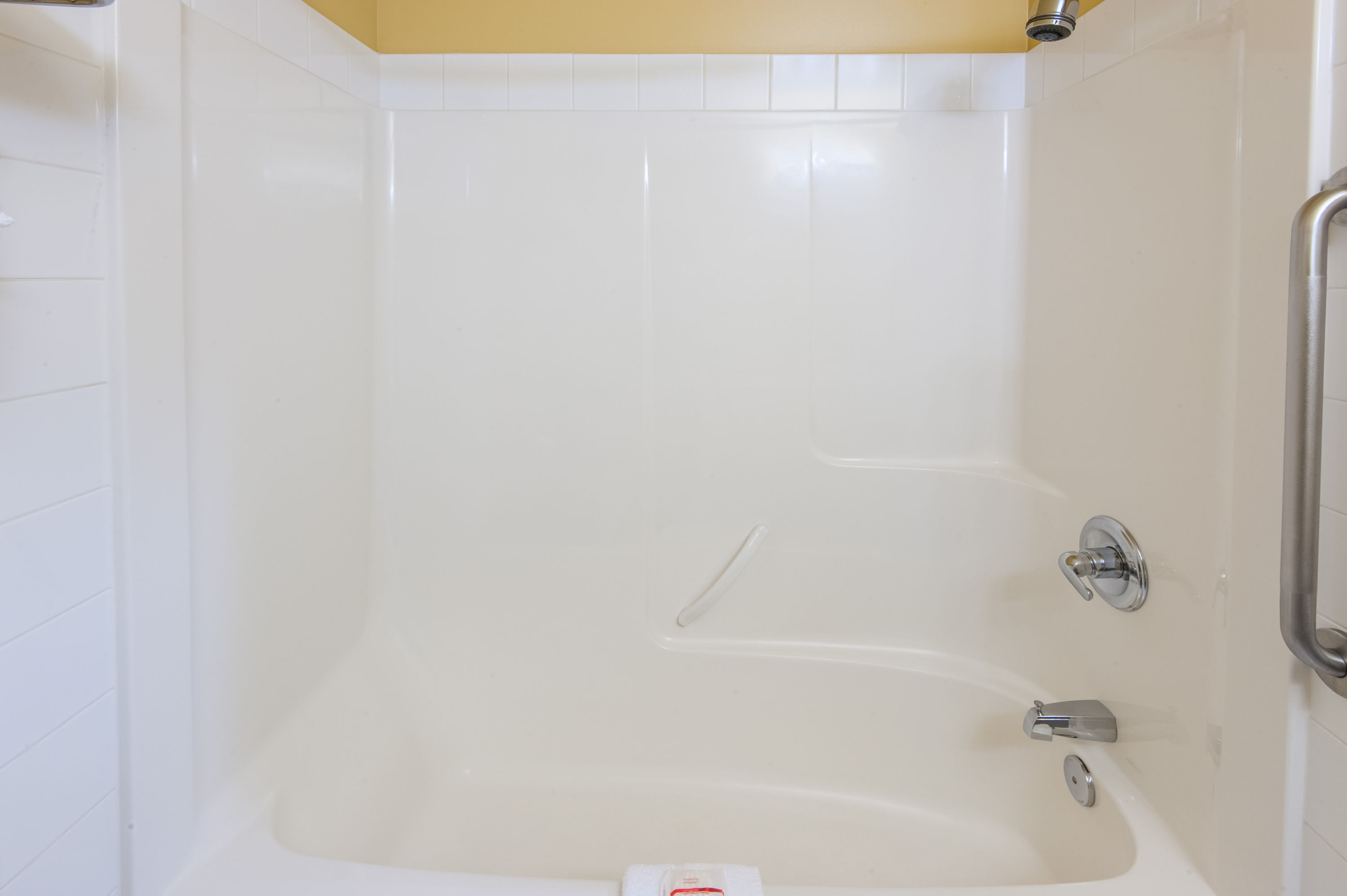 Guest room at the Super 8 by Wyndham Cochrane in Cochrane, Alberta