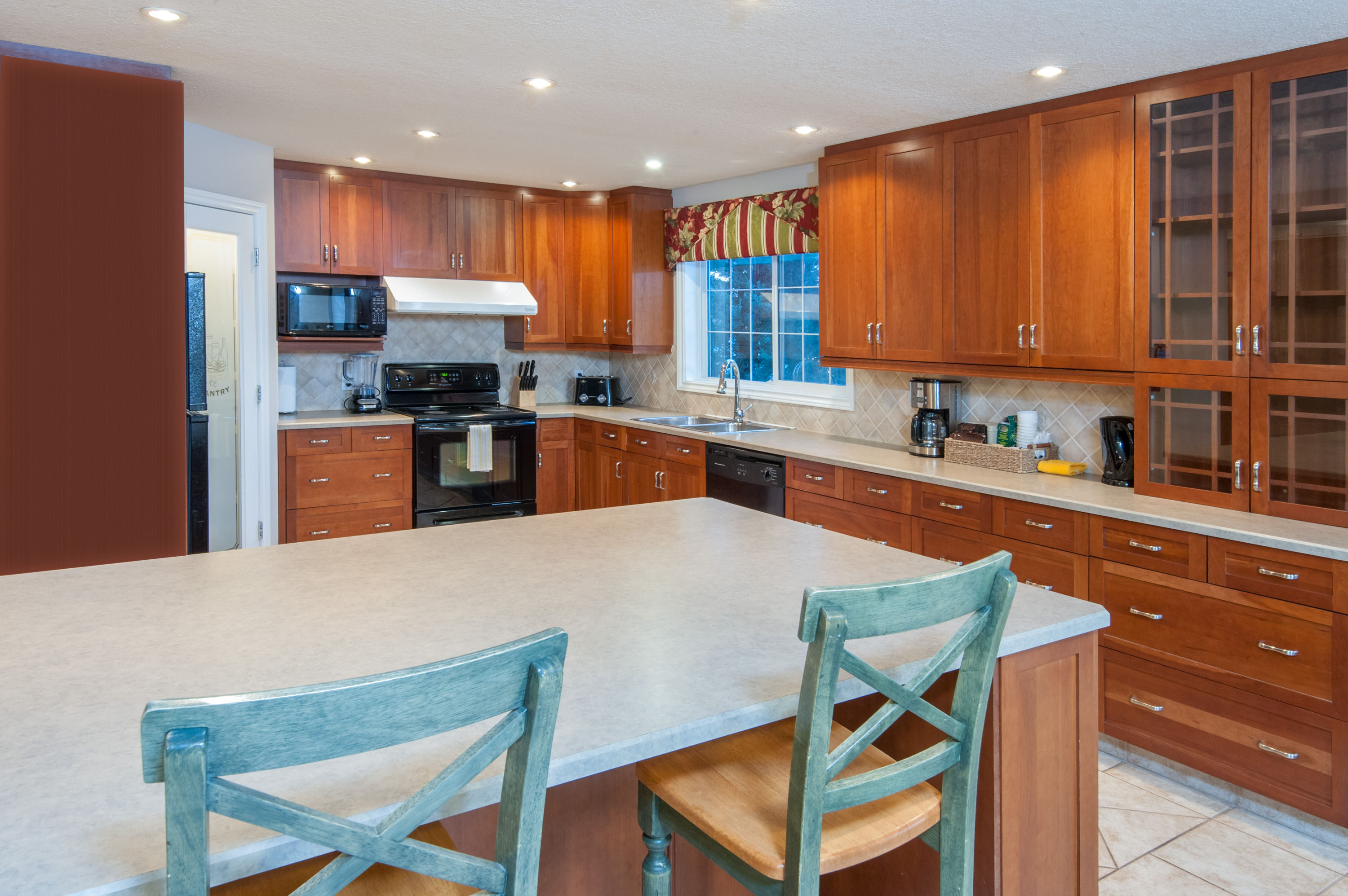 Guest room at the Super 8 by Wyndham Cochrane in Cochrane, Alberta