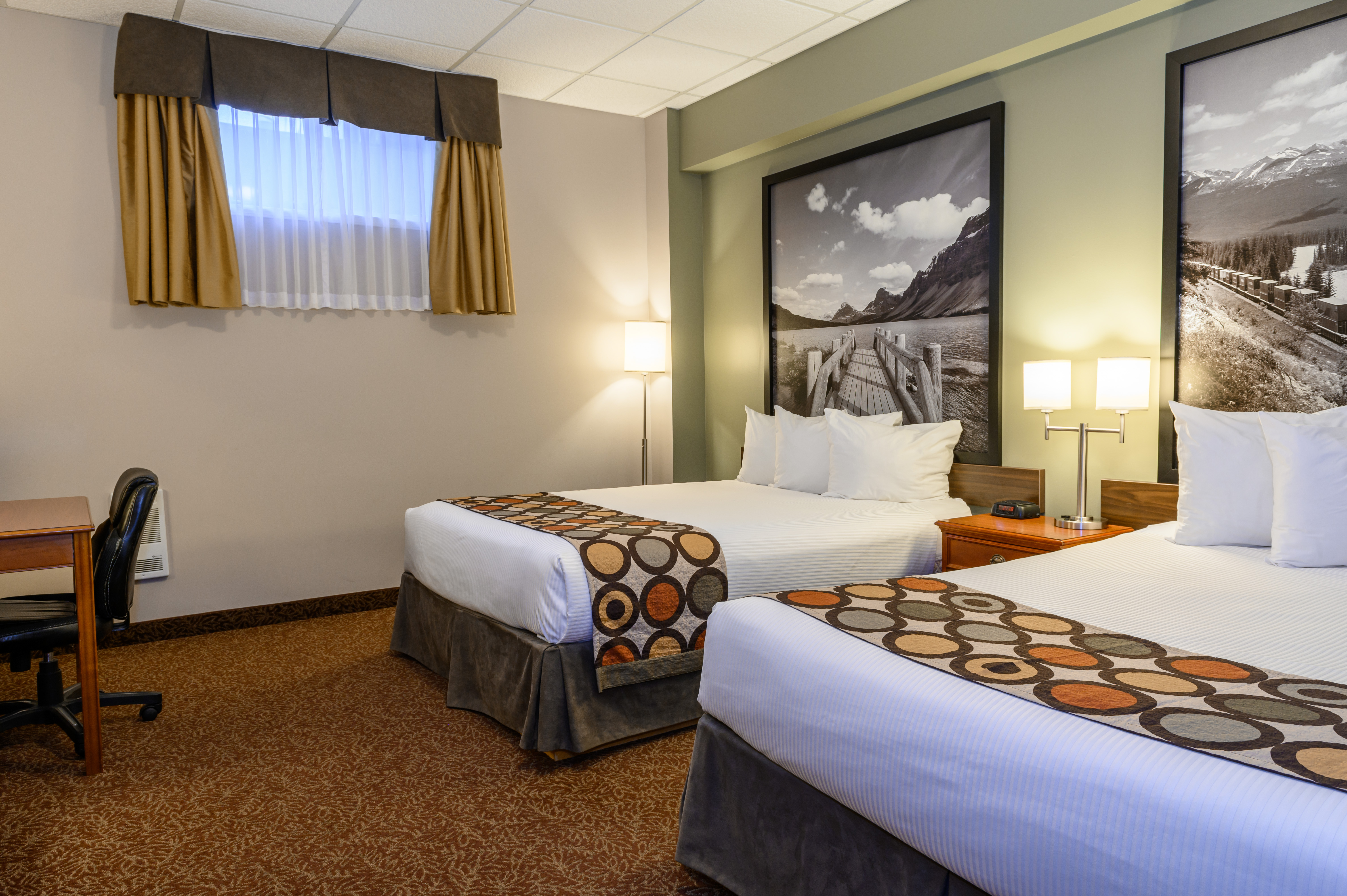 Guest room at the Super 8 by Wyndham Cochrane in Cochrane, Alberta