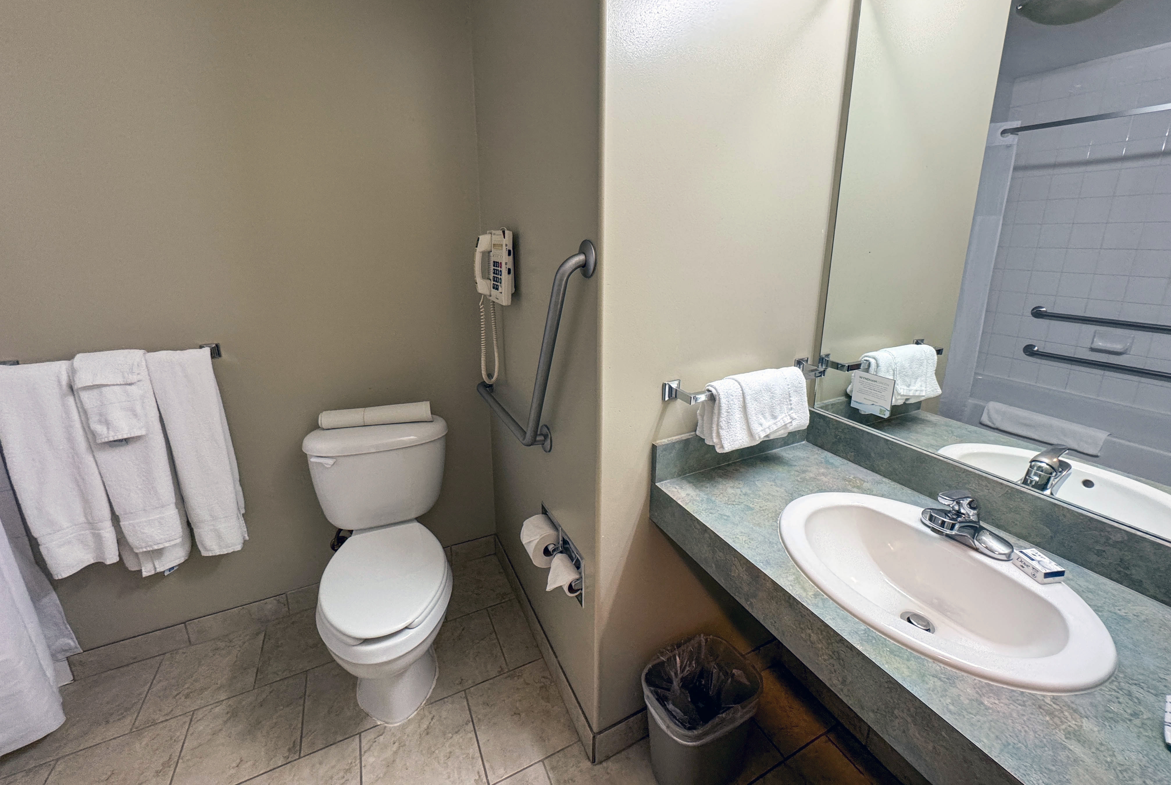 Guest room bath at the Super 8 by Wyndham Edmonton South in Edmonton, Alberta