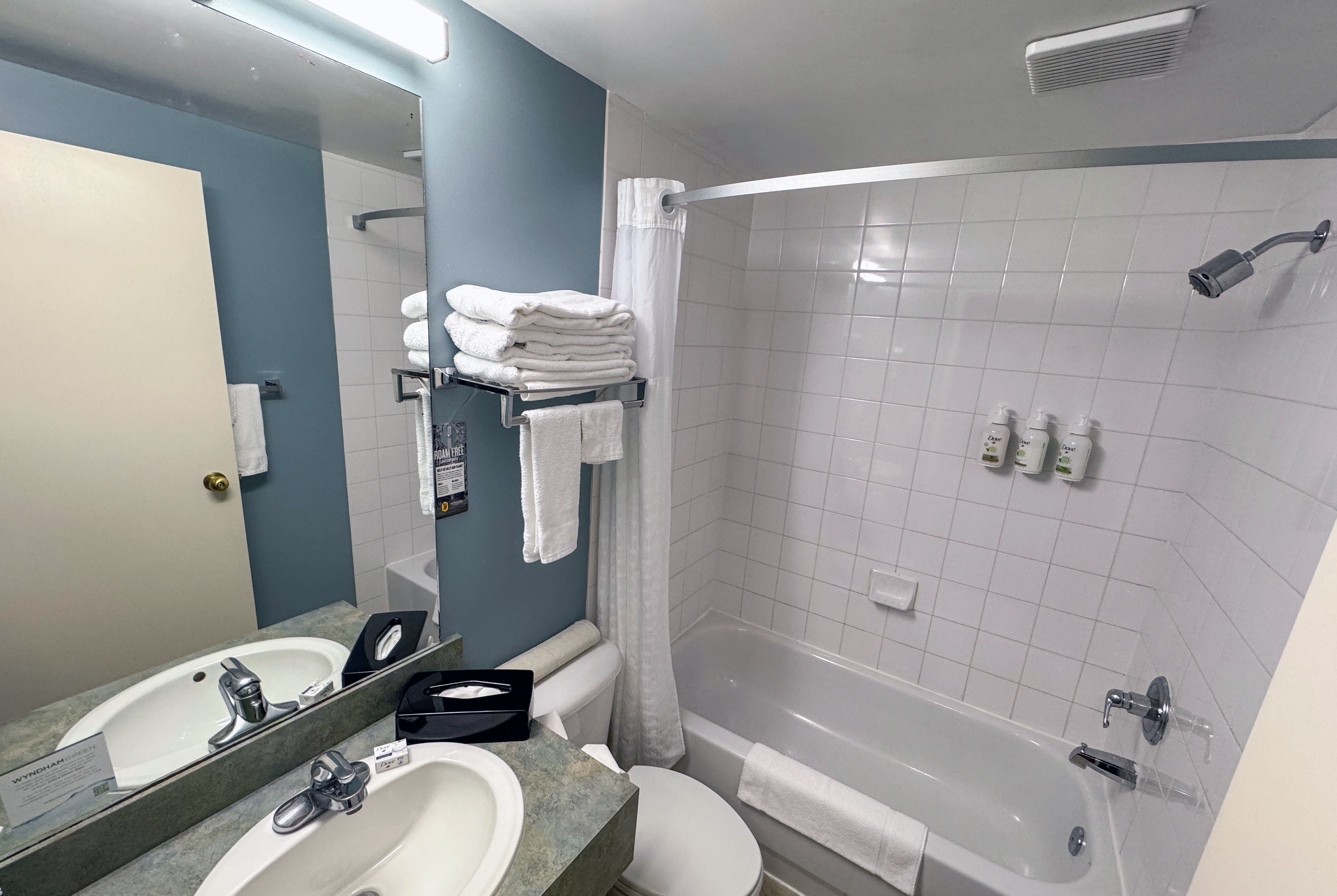 Guest room bath at the Super 8 by Wyndham Edmonton South in Edmonton, Alberta