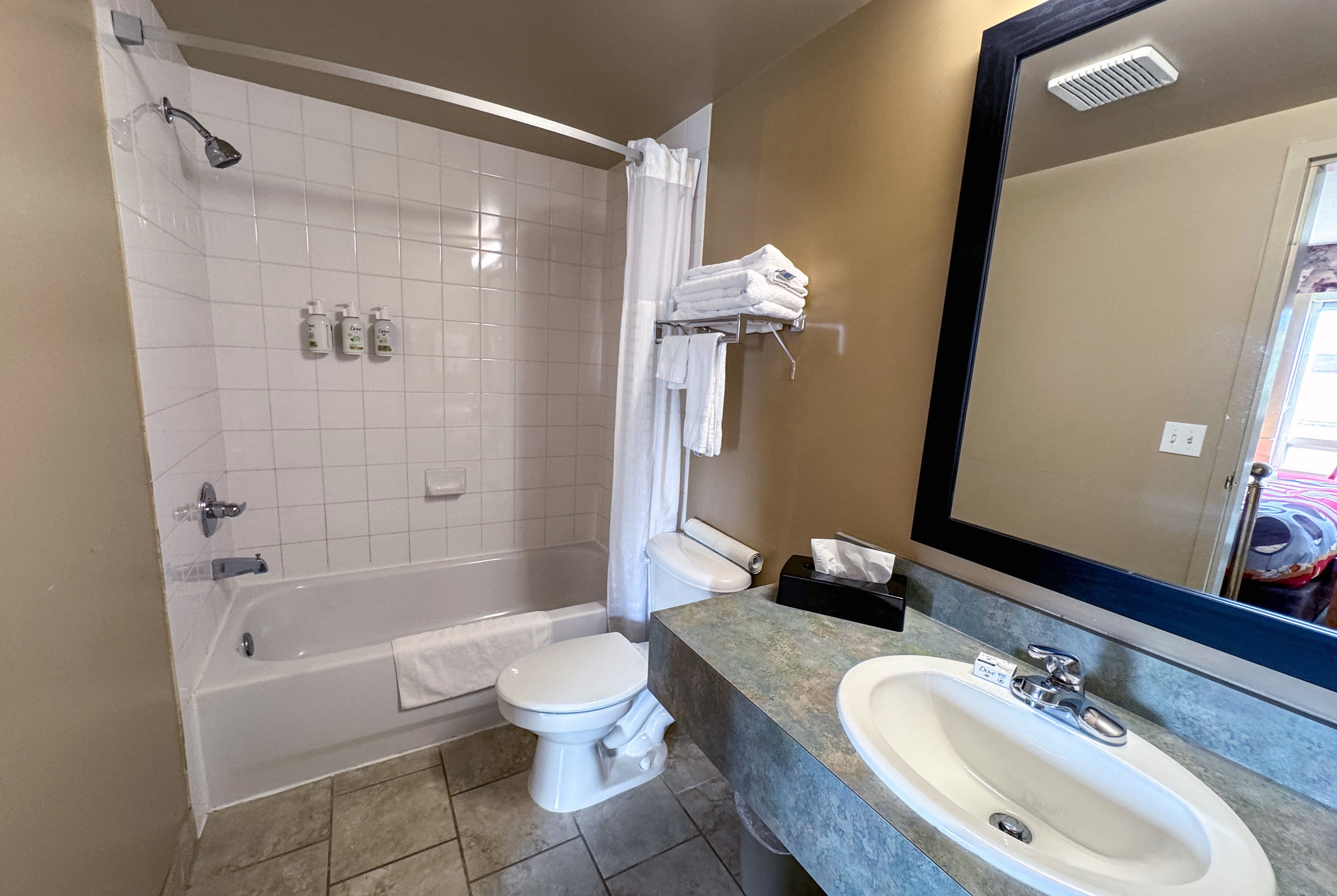 Guest room bath at the Super 8 by Wyndham Edmonton South in Edmonton, Alberta