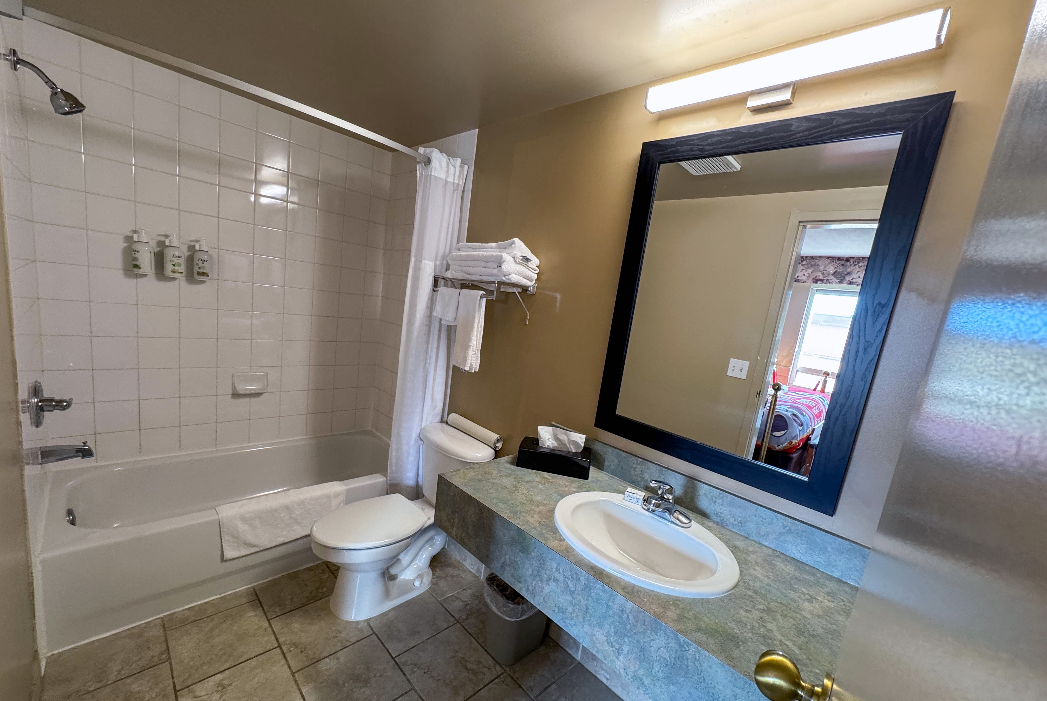 Guest room bath at the Super 8 by Wyndham Edmonton South in Edmonton, Alberta