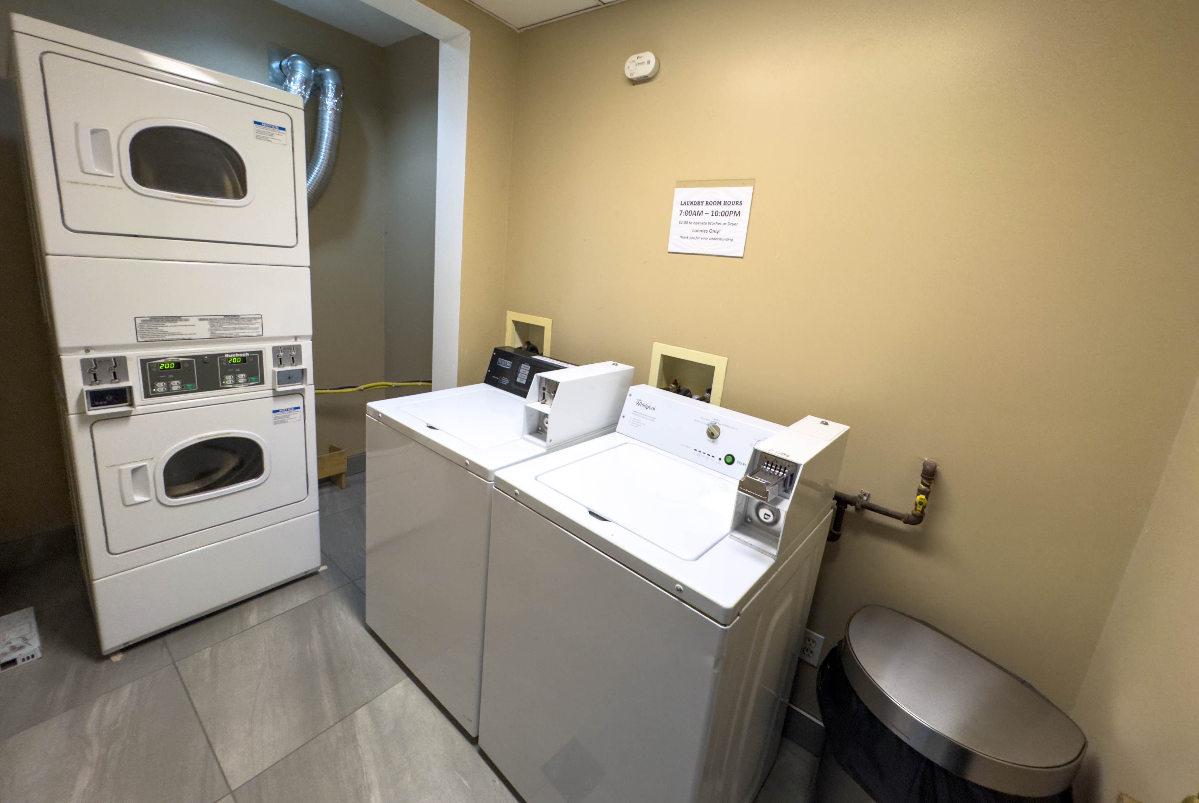 Laundry facilities at Super 8 by Wyndham Edmonton South in Edmonton, Alberta