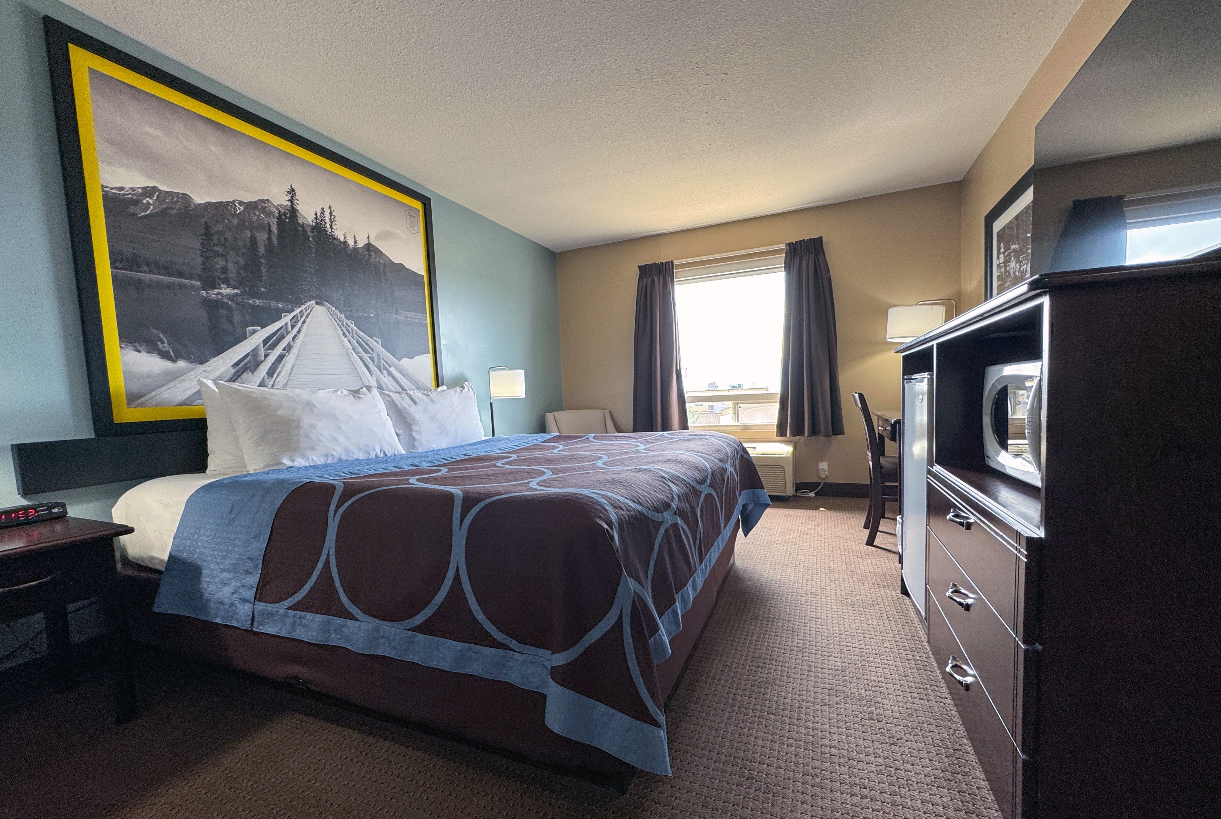 Guest room at the Super 8 by Wyndham Edmonton South in Edmonton, Alberta