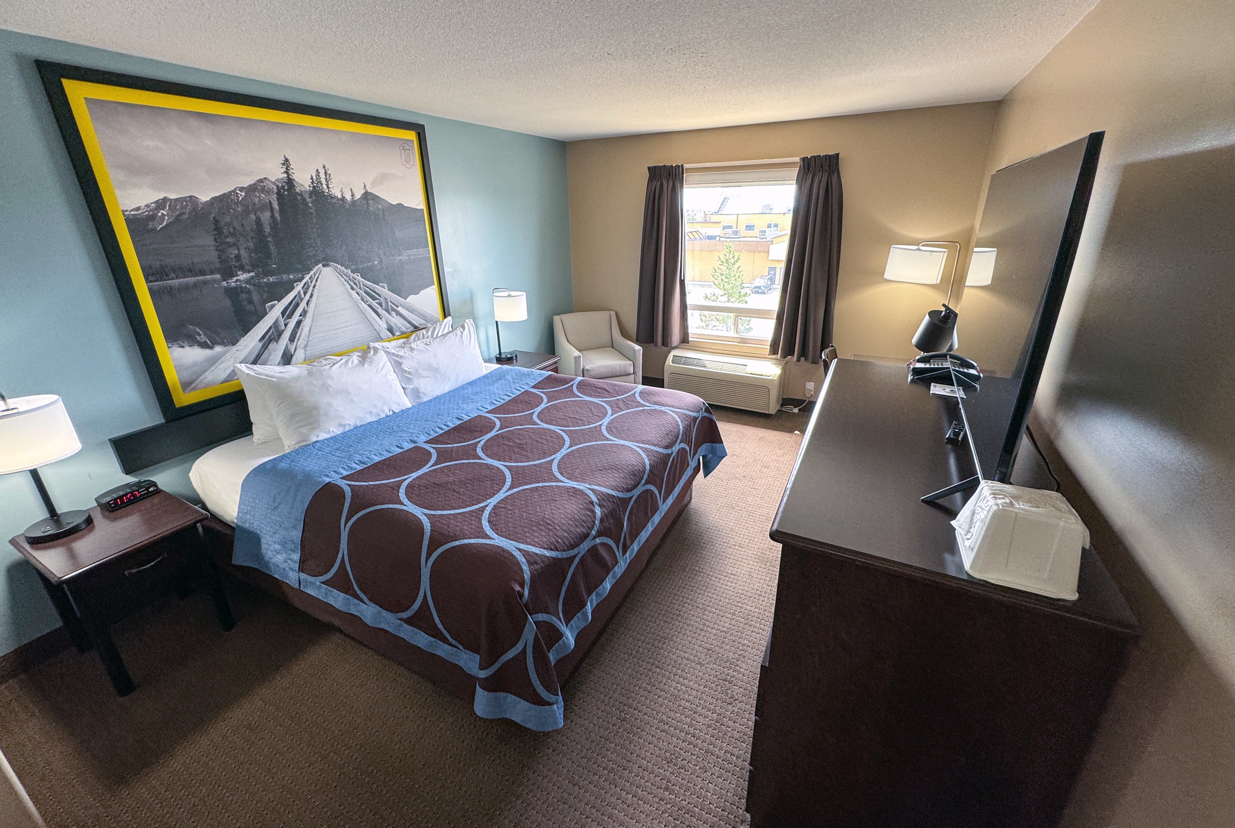 Guest room at the Super 8 by Wyndham Edmonton South in Edmonton, Alberta