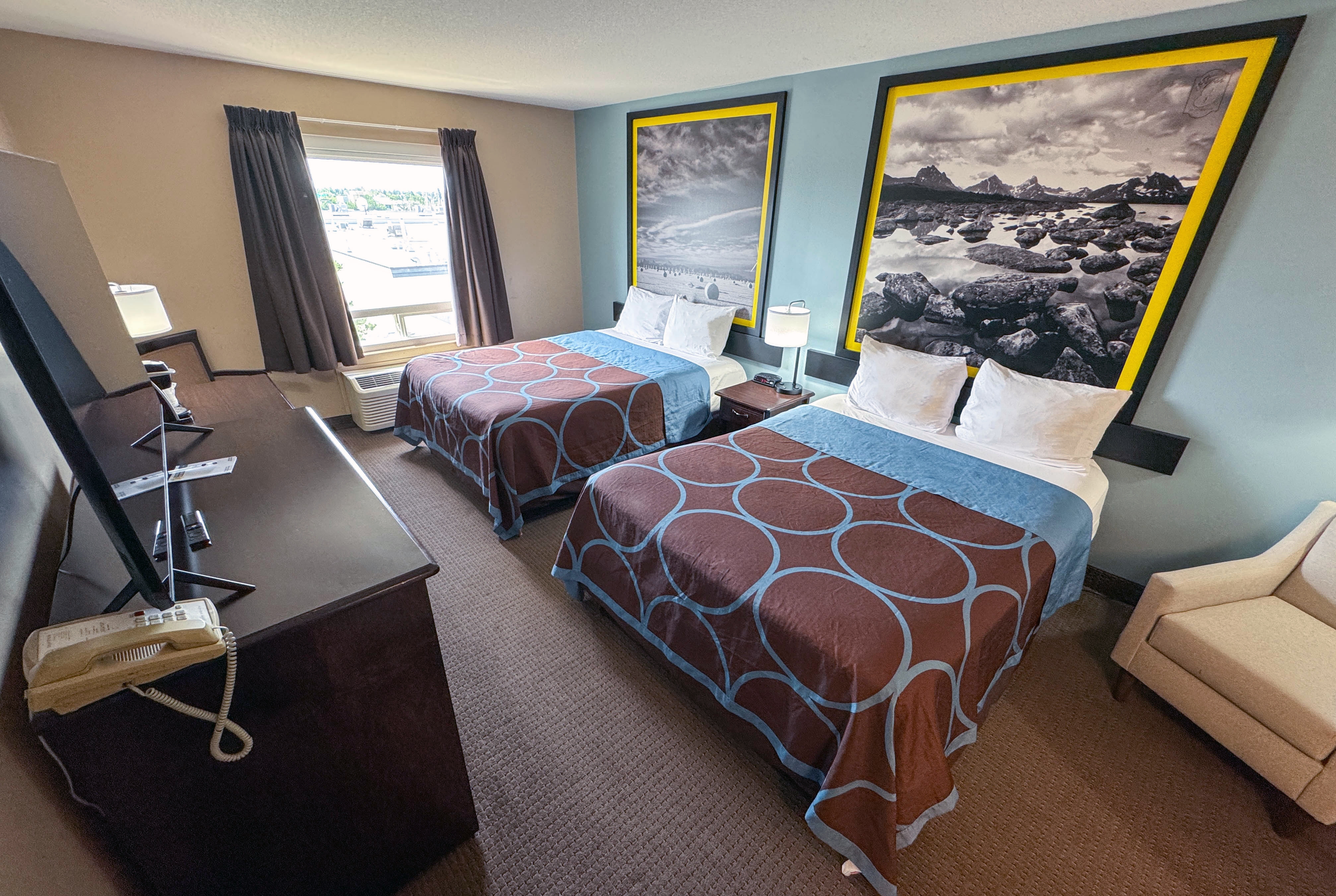 Guest room at the Super 8 by Wyndham Edmonton South in Edmonton, Alberta