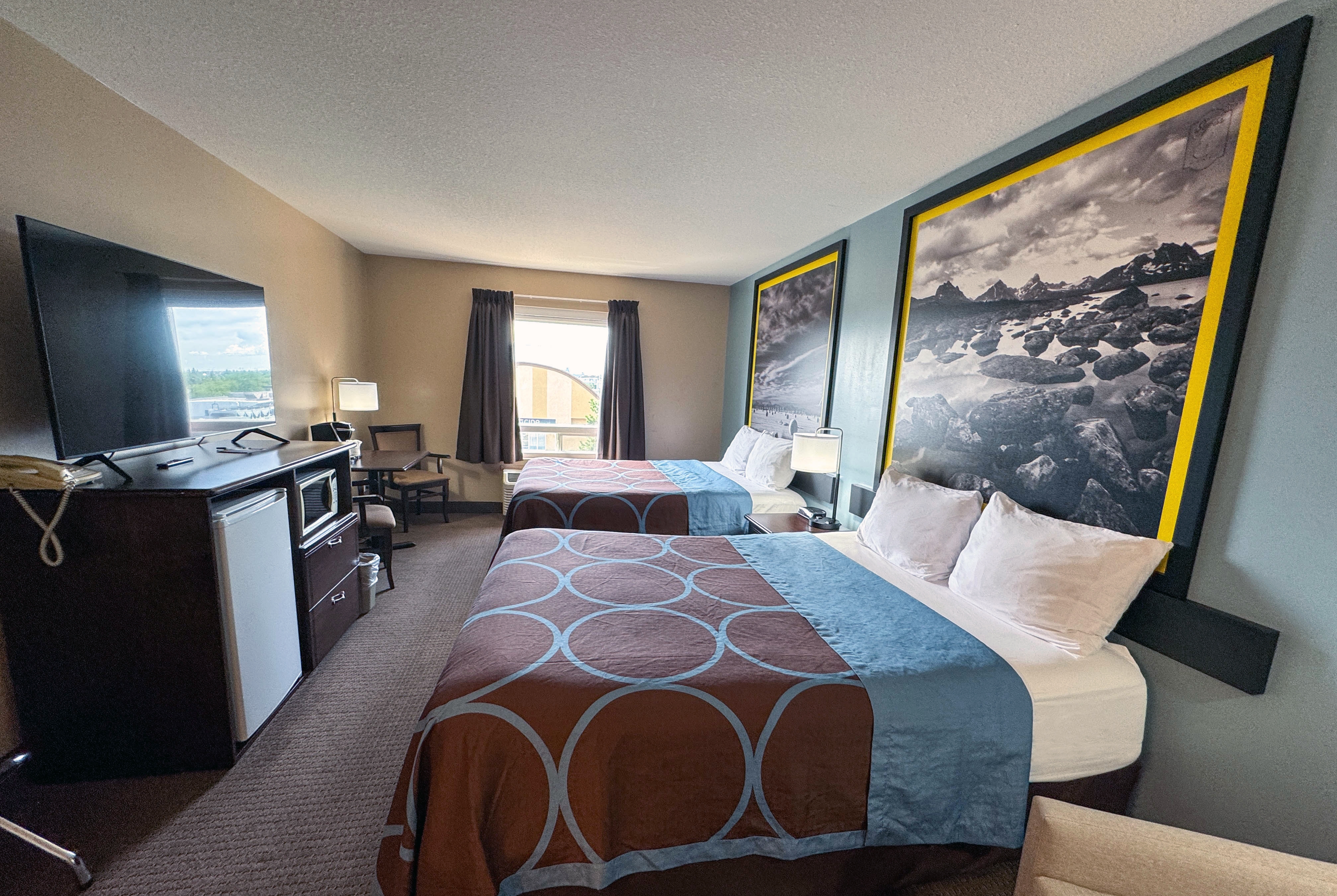 Guest room at the Super 8 by Wyndham Edmonton South in Edmonton, Alberta