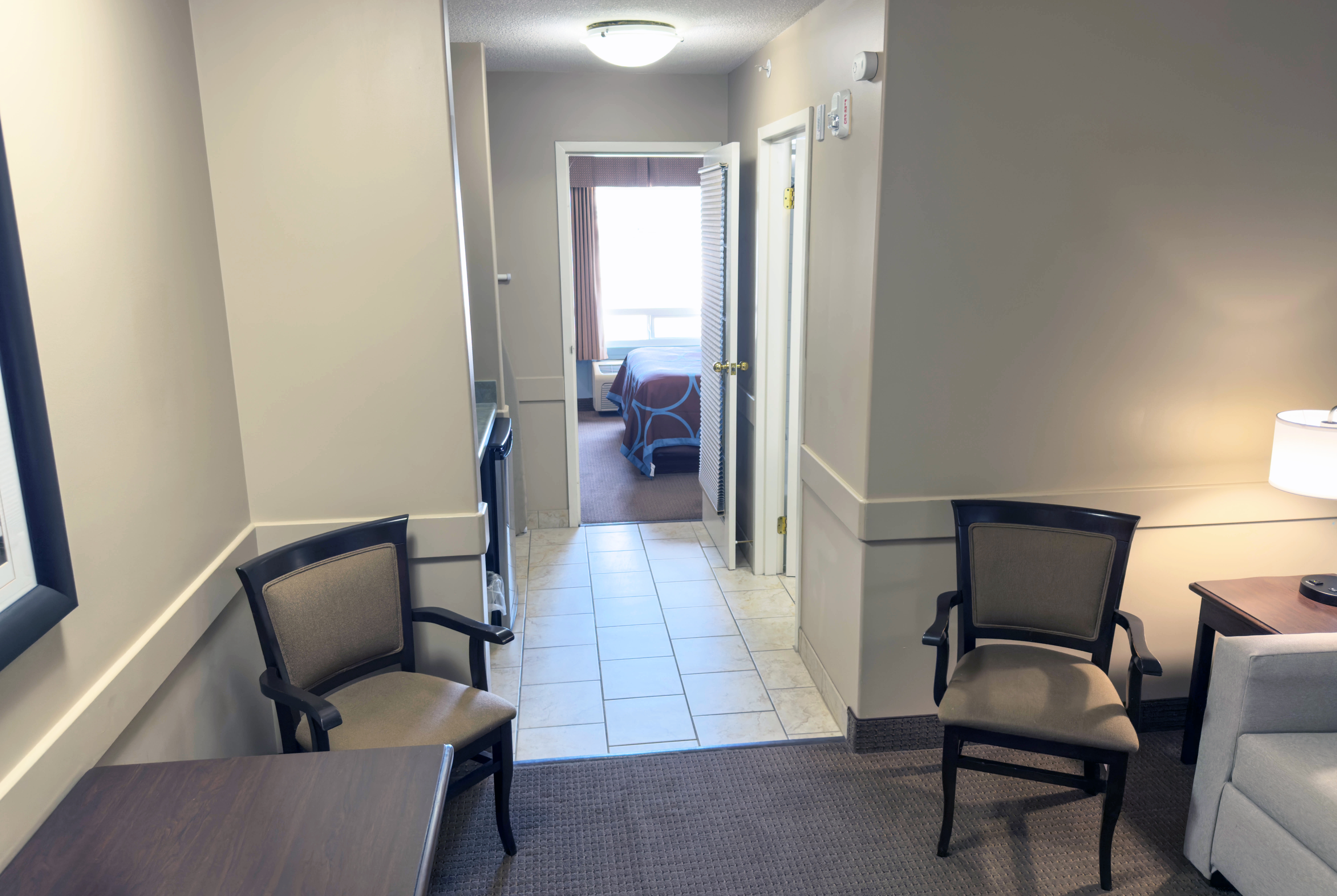 Guest room at the Super 8 by Wyndham Edmonton South in Edmonton, Alberta