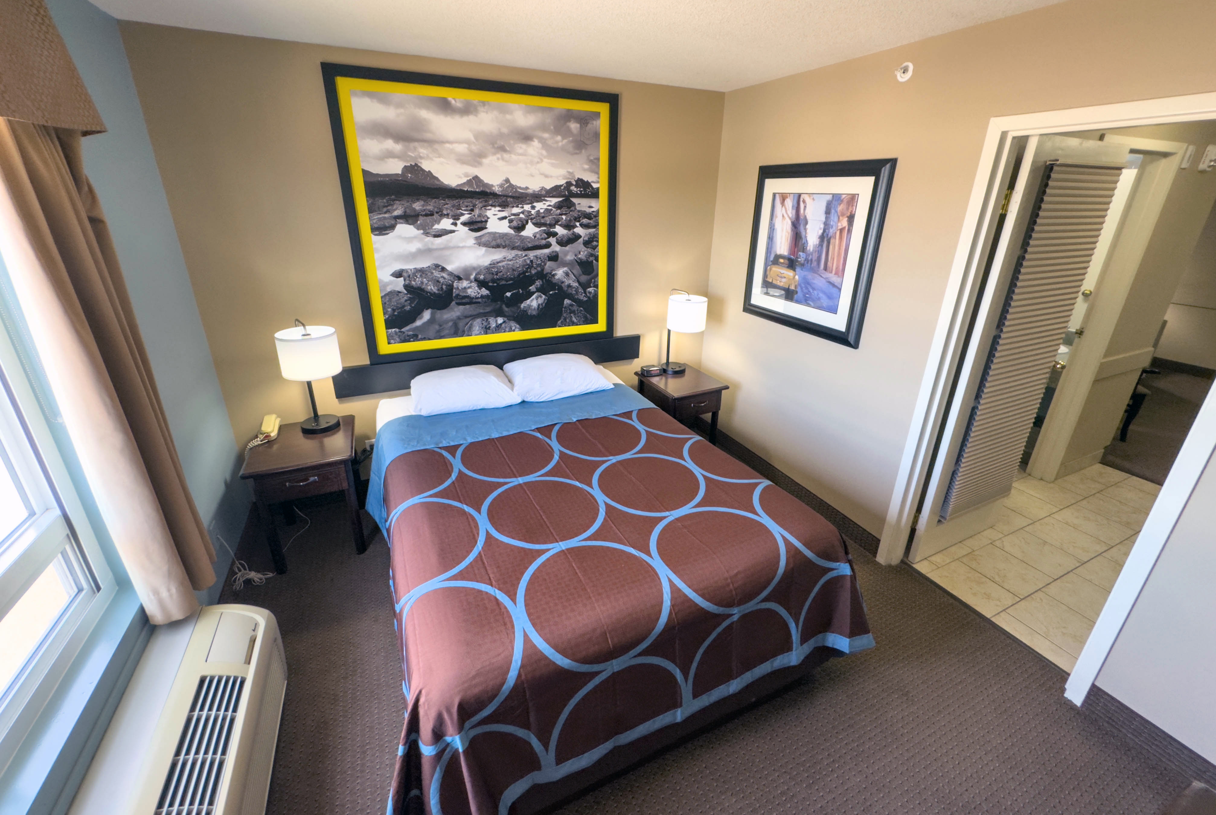 Guest room at the Super 8 by Wyndham Edmonton South in Edmonton, Alberta