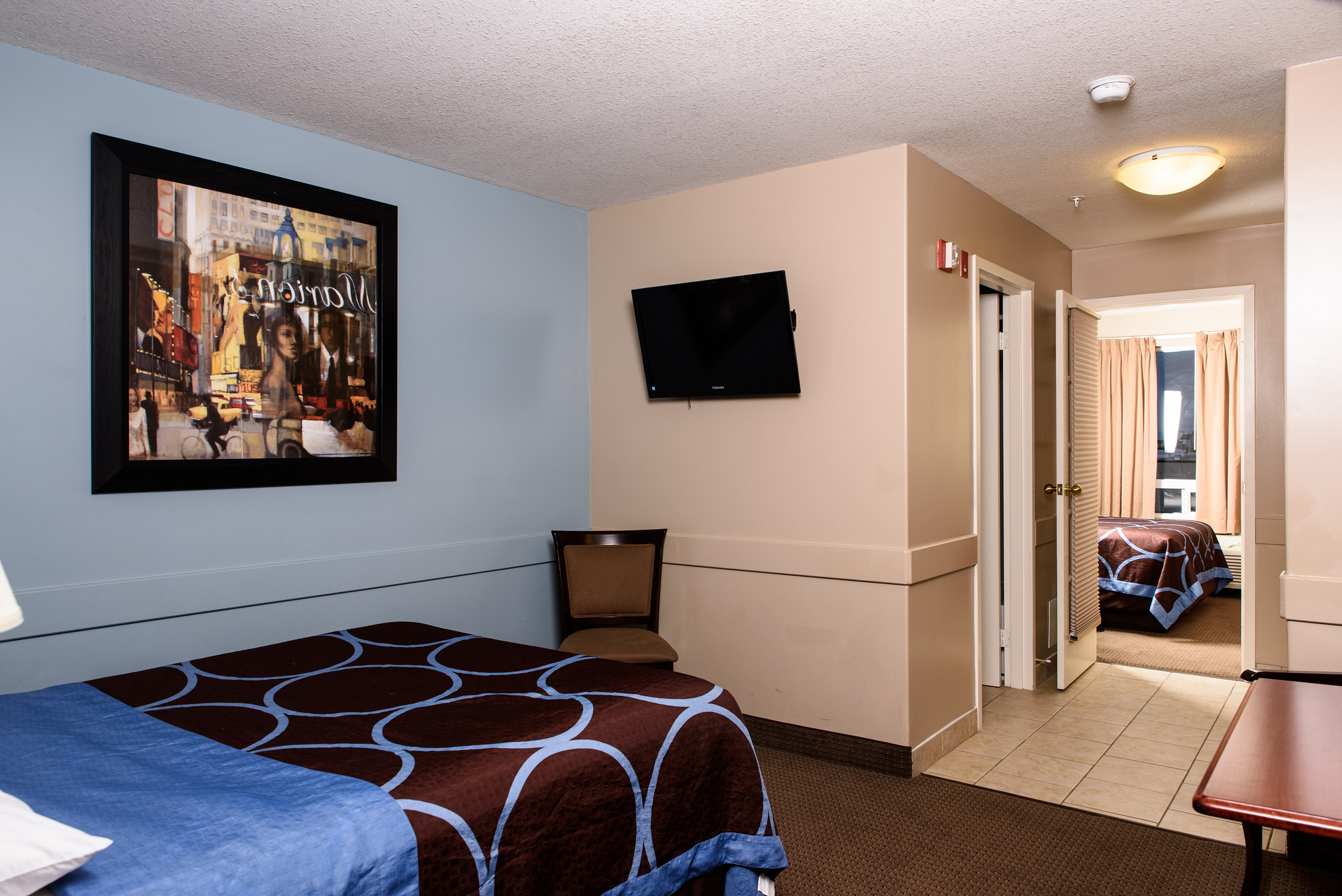 Guest room at the Super 8 by Wyndham Edmonton South in Edmonton, Alberta