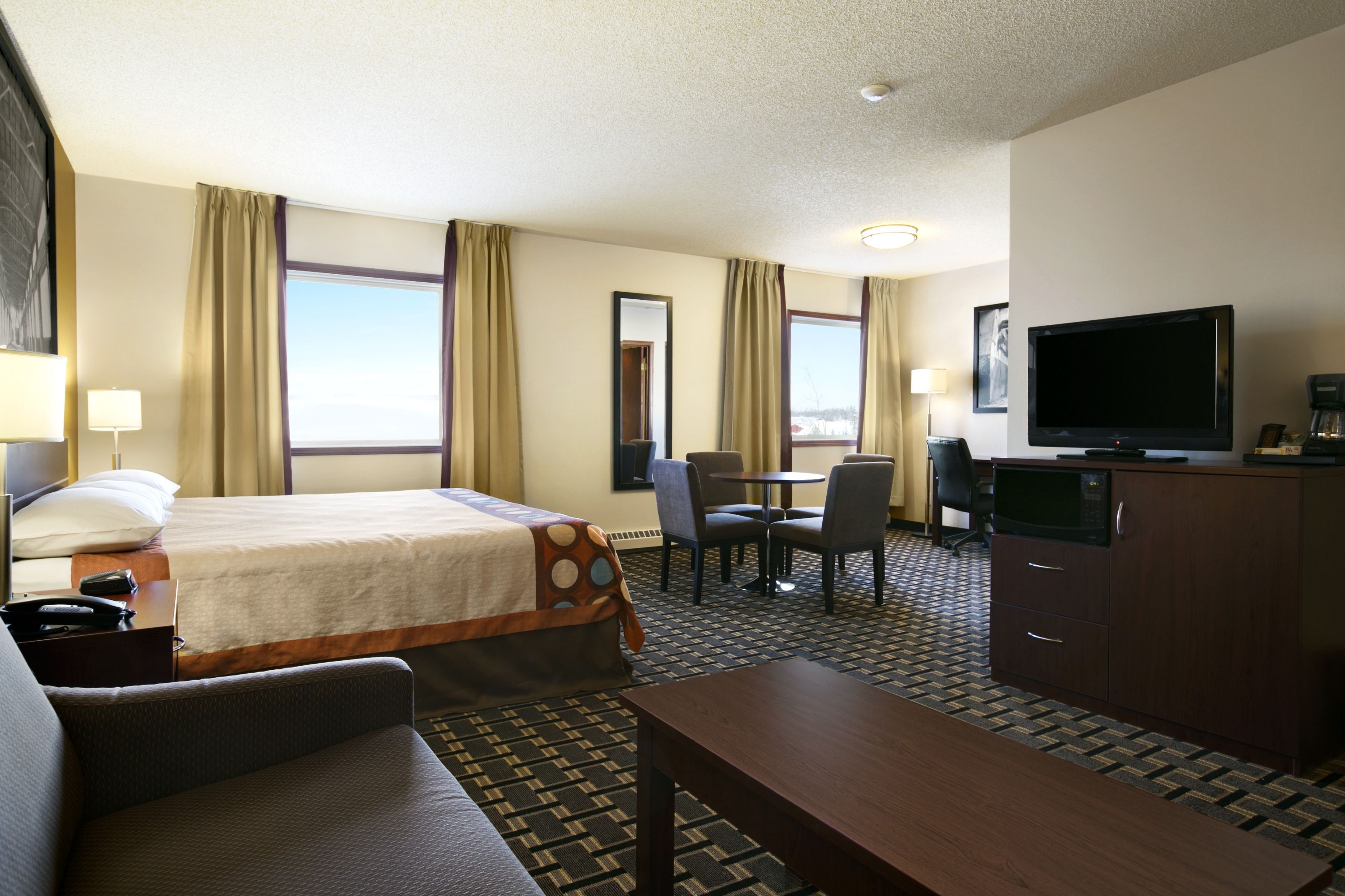 Guest room at the Super 8 by Wyndham Fox Creek in Fox Creek, Alberta