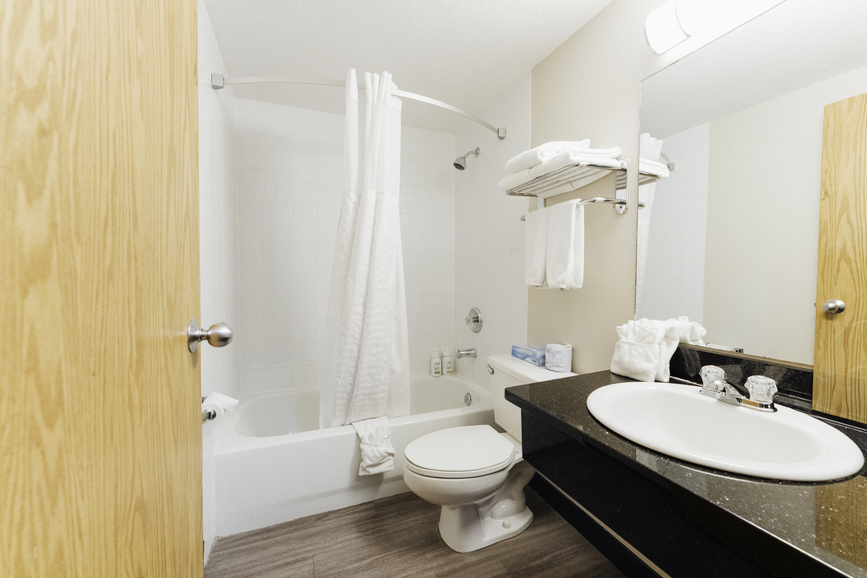 Guest room bath at the Super 8 by Wyndham Grande Prairie in Grande Prairie, Alberta