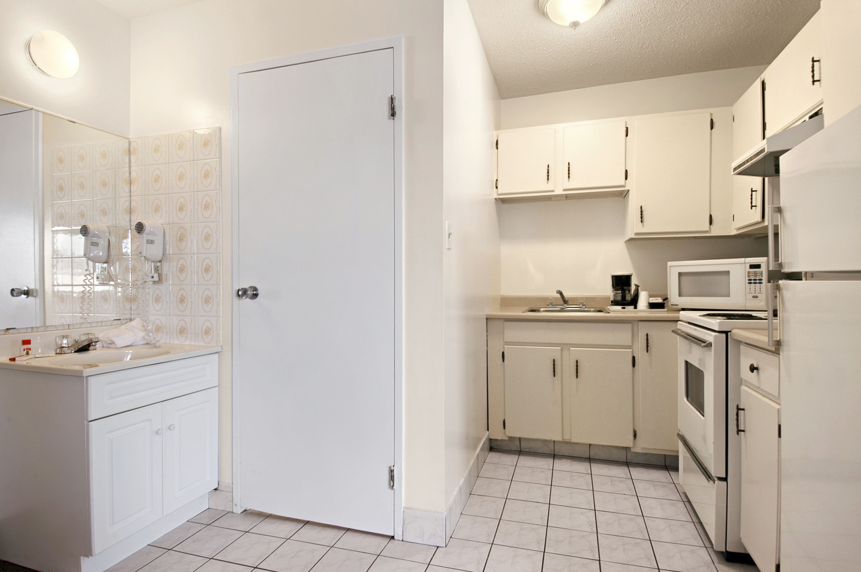 Guest room at the Super 8 by Wyndham Red Deer in Red Deer, Alberta